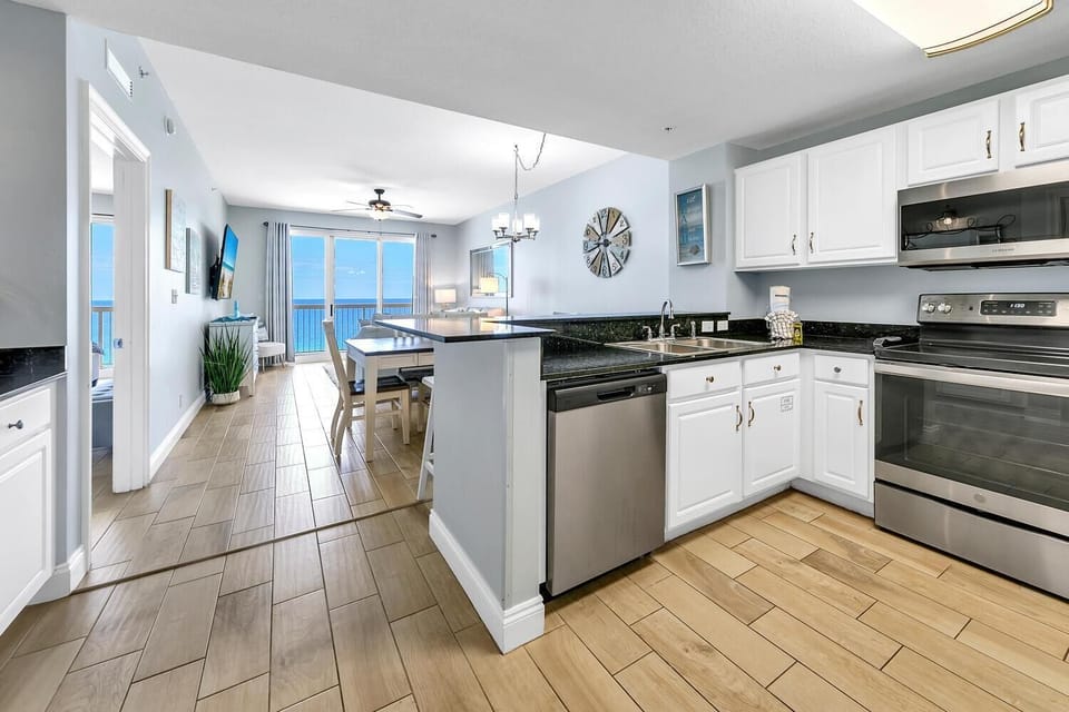 Condo, Multiple Beds (Calypso 2-1102 West) | Private kitchen | Oven, toaster