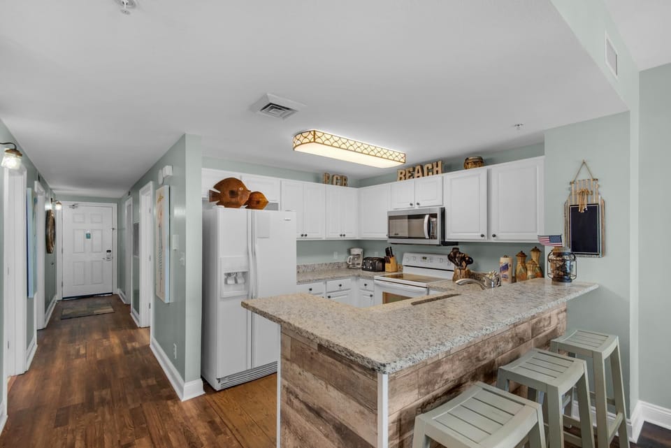 Condo, Multiple Beds (Calypso 1-608 East) | Private kitchen | Oven, toaster