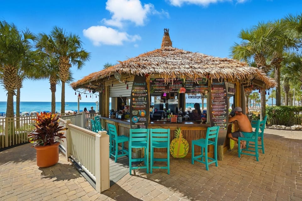 Condo, Multiple Beds (Calypso 1-1809 East) | Bar (on property)