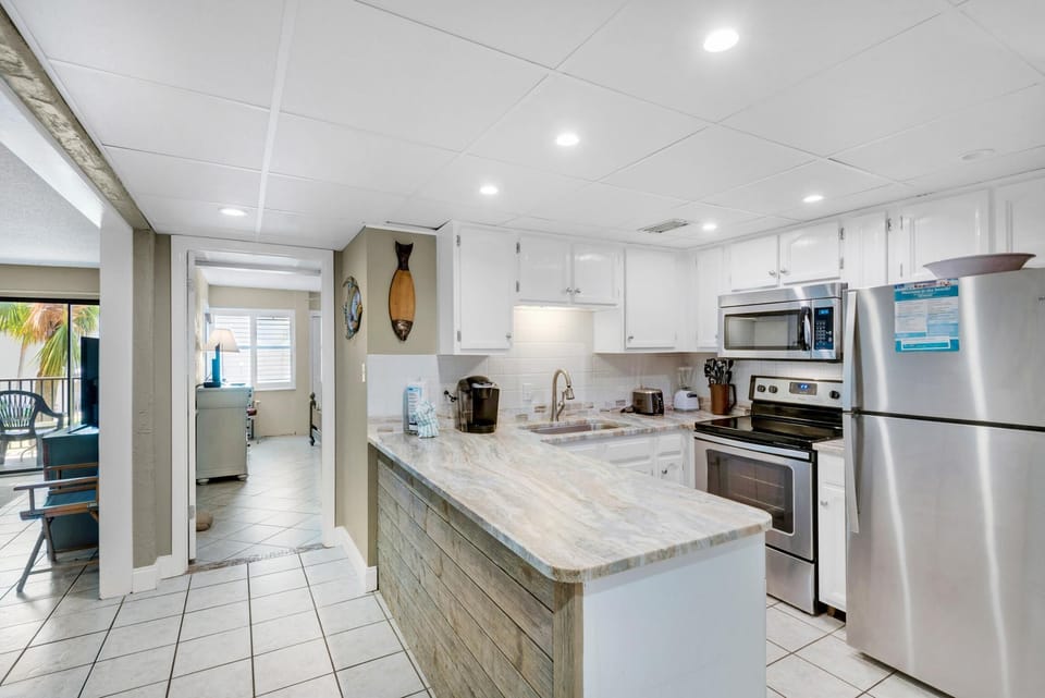 Condo, 1 King Bed with Sofa bed (Sugar Beach C-2) | Private kitchen | Oven, toaster