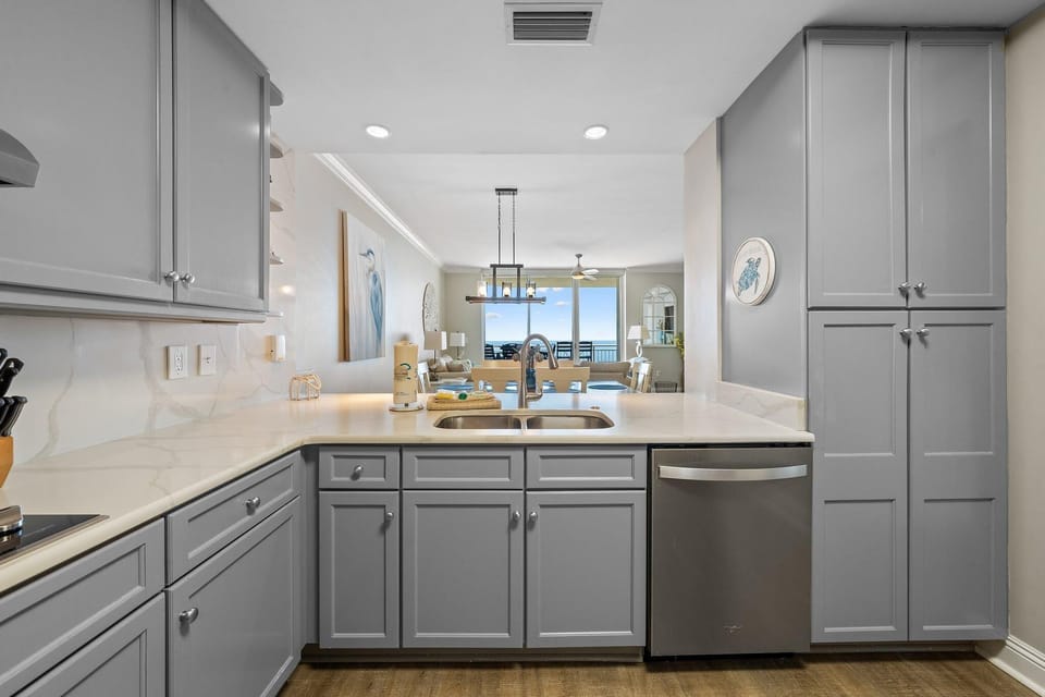 Condo, Multiple Beds (Indigo East 1205) | Private kitchen | Oven, toaster, paper towels