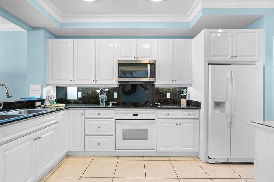 Condo, Multiple Beds (Beach Colony East 11C) | Private kitchen | Oven, toaster, paper towels