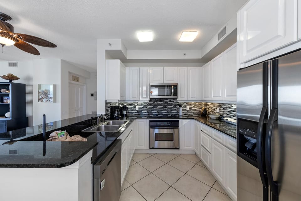 Condo, Multiple Beds (Beach Colony East 10A) | Private kitchen | Oven, toaster, paper towels