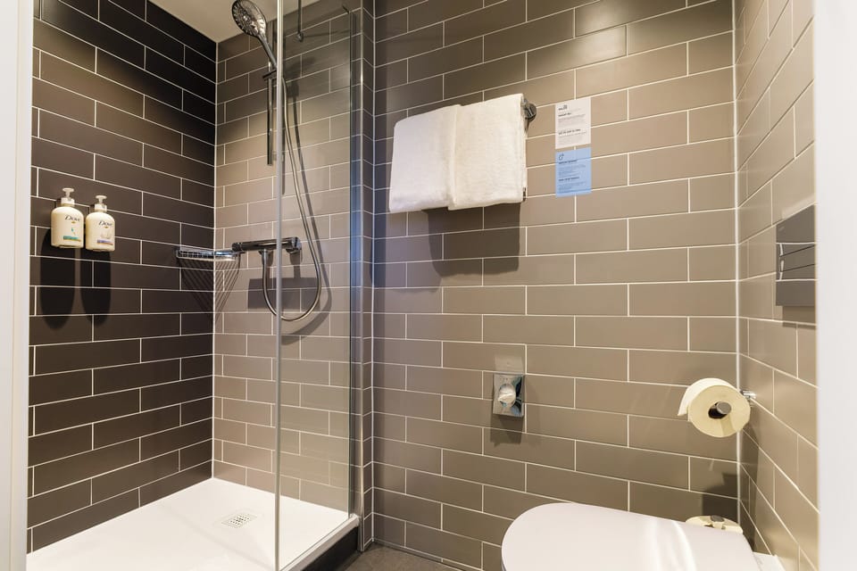 Shower, free toiletries, hair dryer, towels