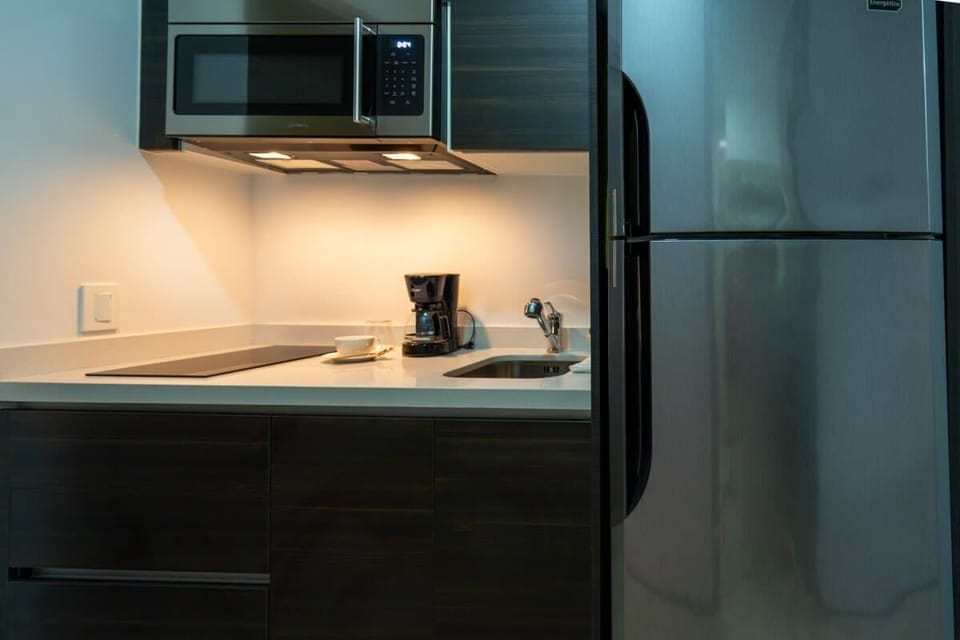 Well-equipped kitchenette; start your day with coffee.