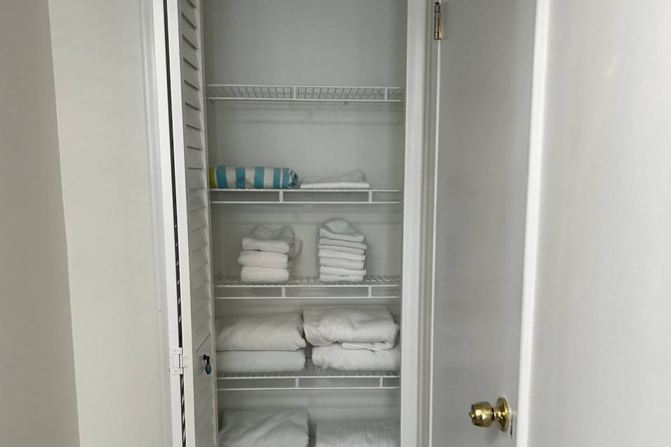 Closet with extra towels and linens