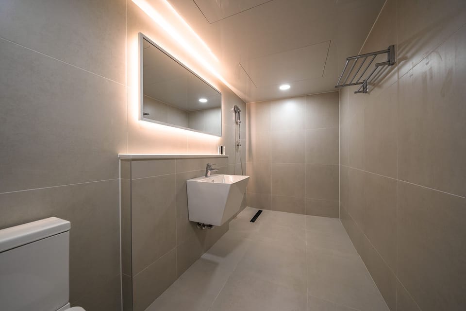 Family Triple Room | Bathroom | Shower, designer toiletries, hair dryer, bathrobes
