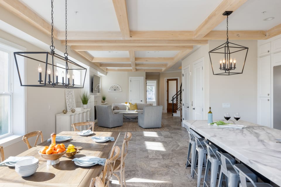 Stunning, bright interior features modern finishes and rustic beachy accents.