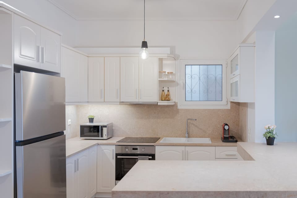 Comfort Apartment | Private kitchen | Full-size fridge, microwave, oven, stovetop