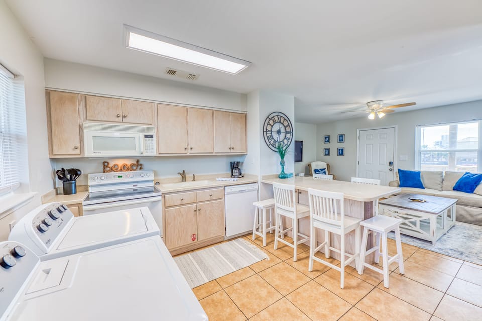 Fully Stocked Kitchen with Washer & Dryer in unit so you can wash Beach Towels and bathing suits 