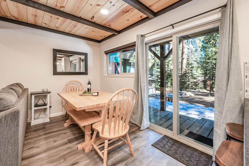 The kitchen is open to the dining area. It is a great space to visit while preparing meals.