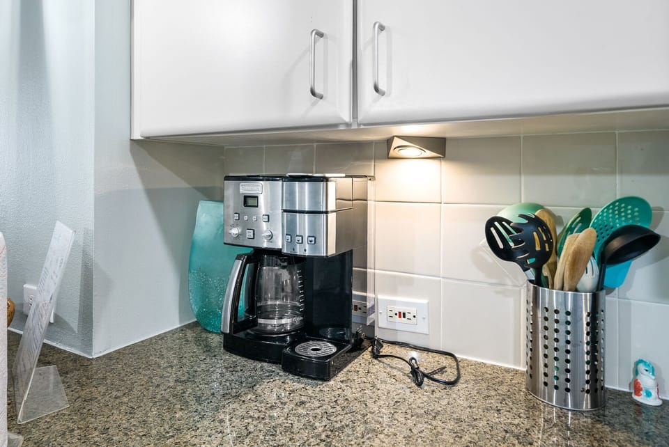 Start your mornings right with your own coffee maker and fully equipped kitchen counter, complete with utensils and everything you need.