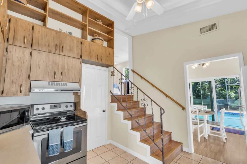 Kitchen to Primary Bedroom, Dining room and Pool