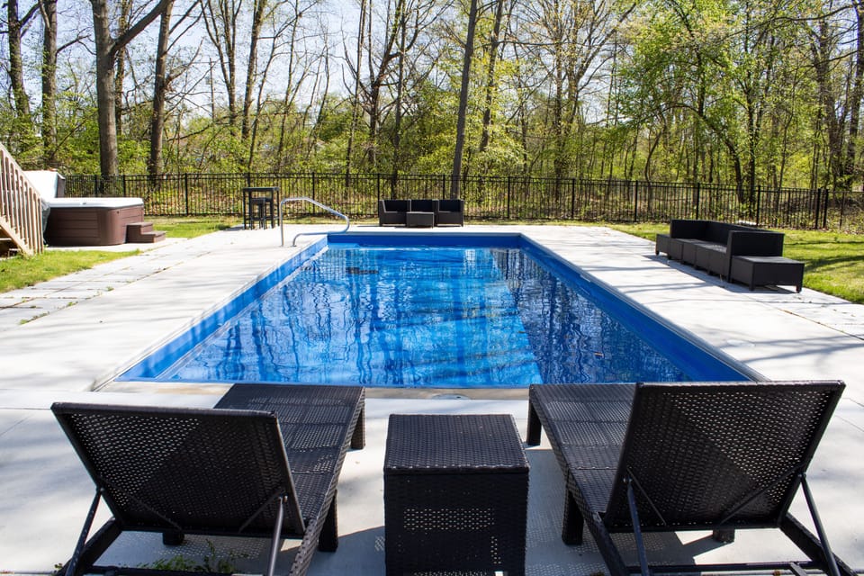 Enjoy a dip in the pool in the backyard