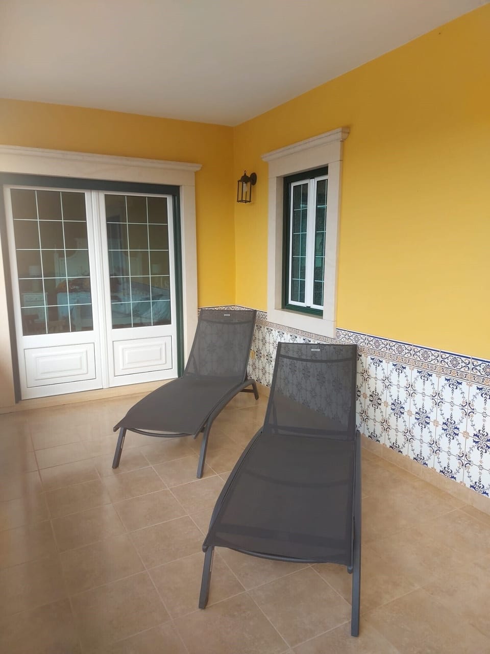 Sun-loungers are available on the upper south facing terrace
