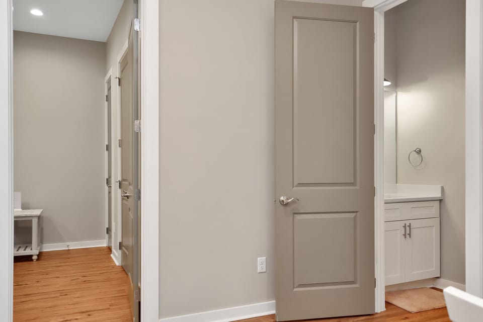 Half Bath and Bedroom 1 on Ground Floor