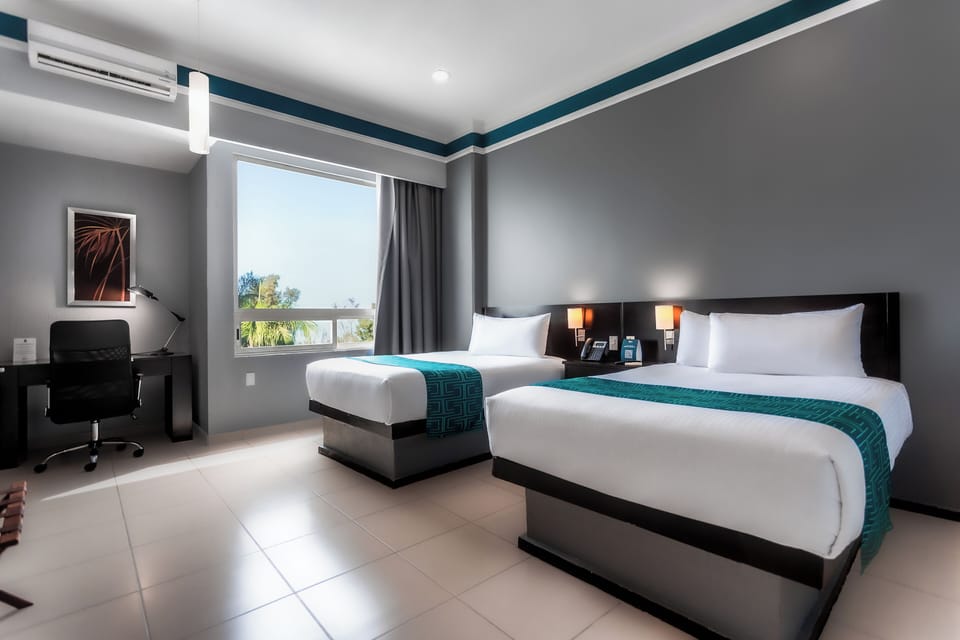 Deluxe Double Room | Hypo-allergenic bedding available, minibar, in-room safe, desk