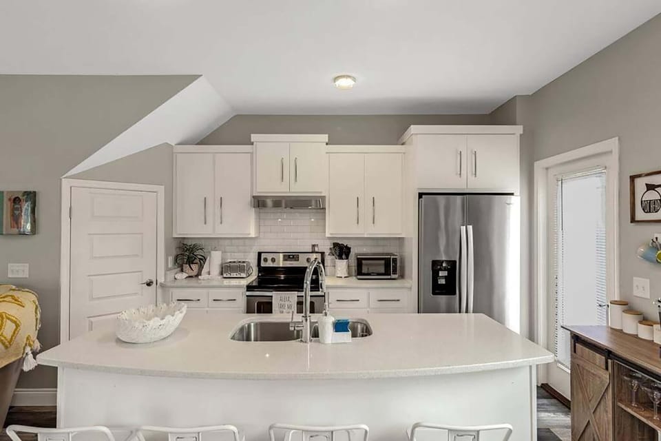 Kitchen with eat-in bar seating