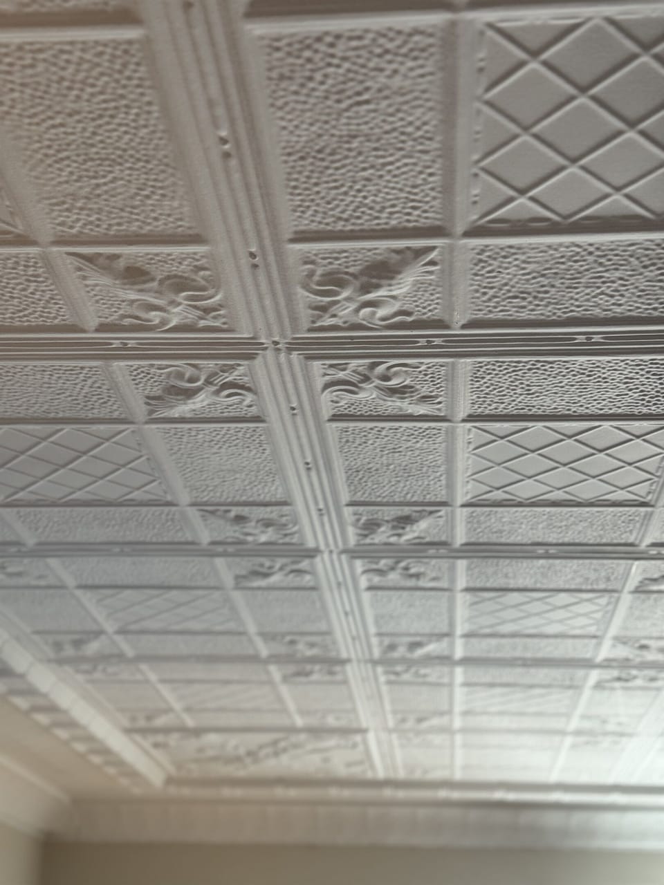 Cooperstown Cottage amazing original details still intact are evident in tin ceilings.