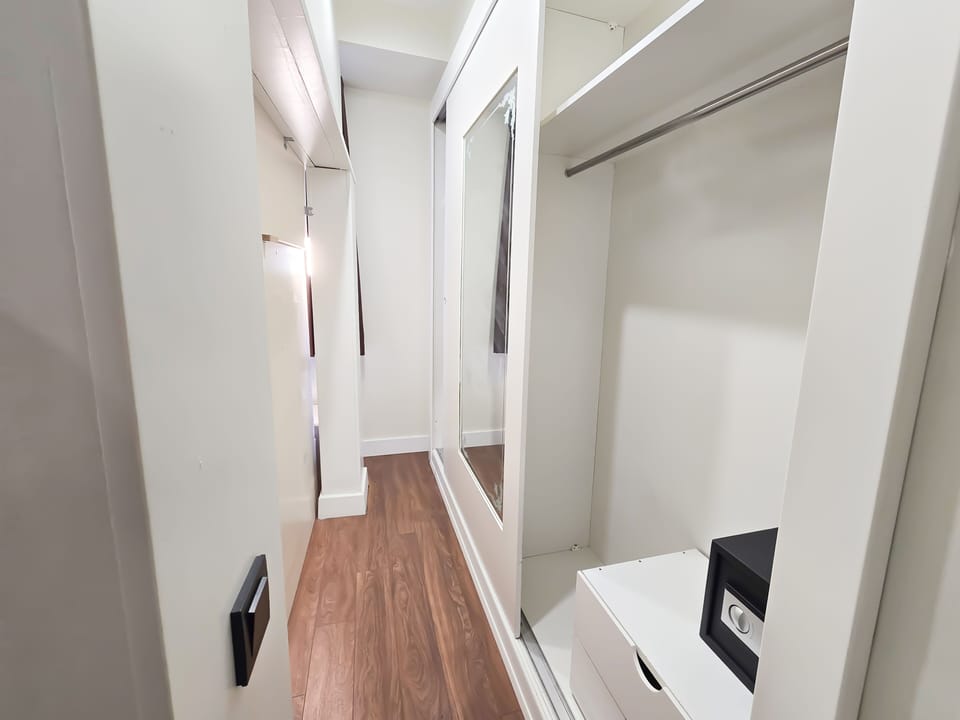 Penthouse | Living area | 30-inch LCD TV with cable channels, heated floors