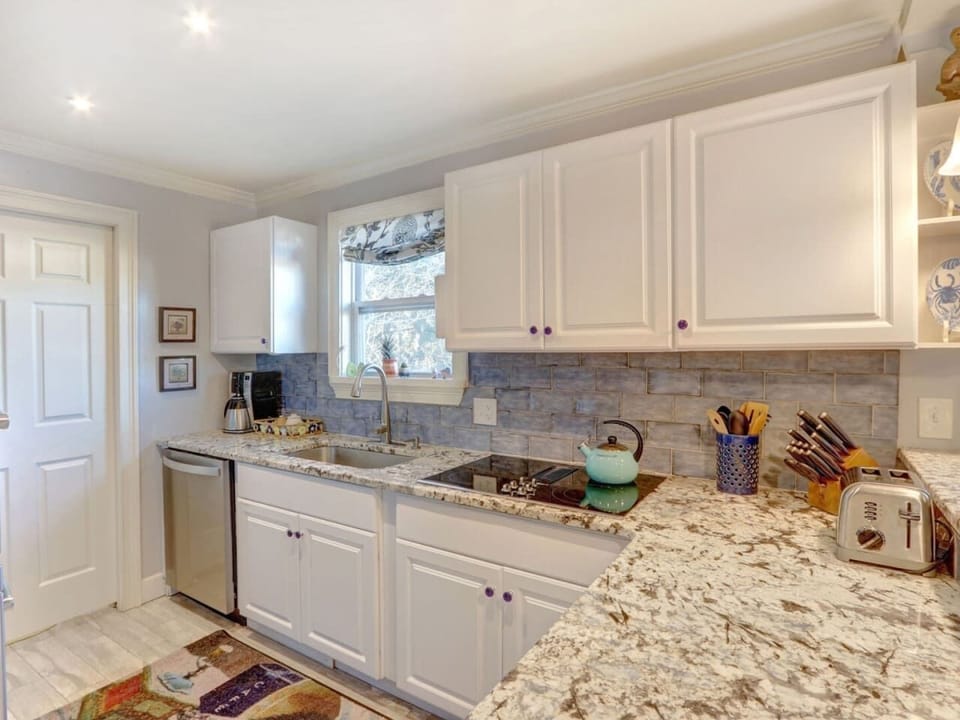 BLue Marlin by You`re On Tybee Tyme Properties large kitchen, lots of counter space, fully stocked.