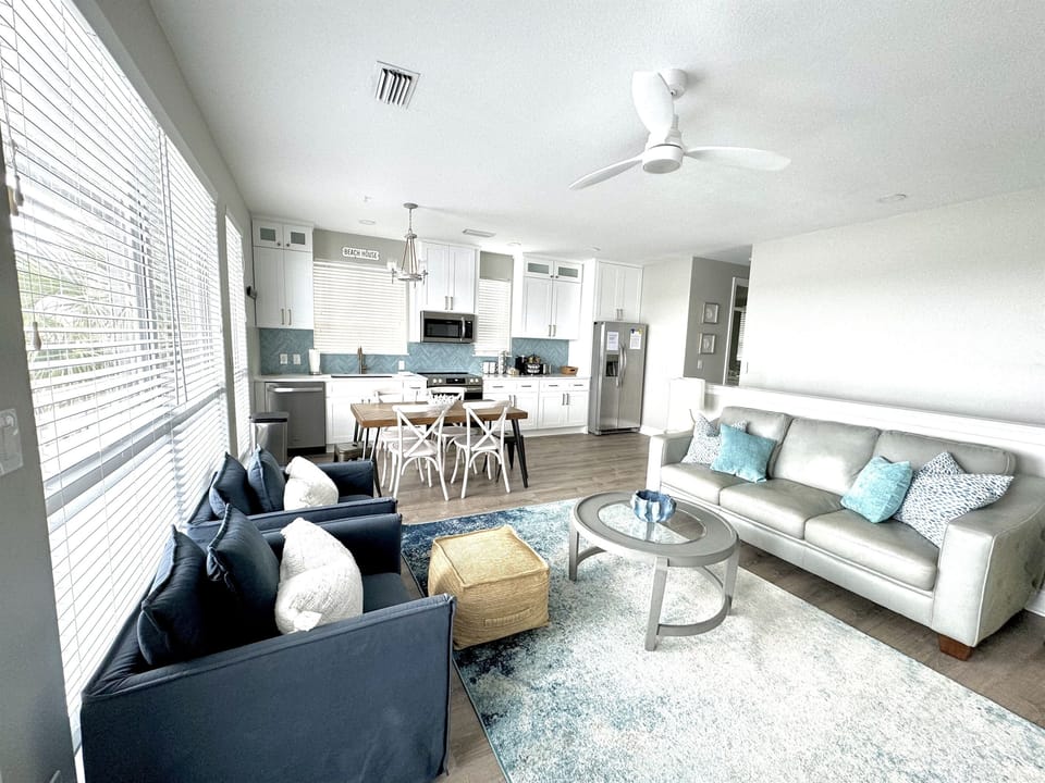 Living room with comfortable seating and queen sleeper sofa bed.