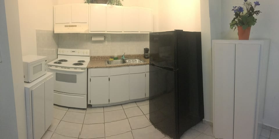 Family Room, 1 Bedroom | Private kitchen | Fridge, microwave, stovetop, cookware/dishes/utensils
