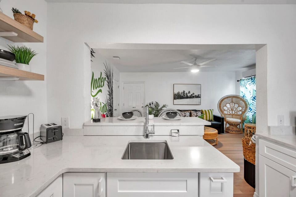 Airy open living space w/ sleek finishes & an easy flow for gathering