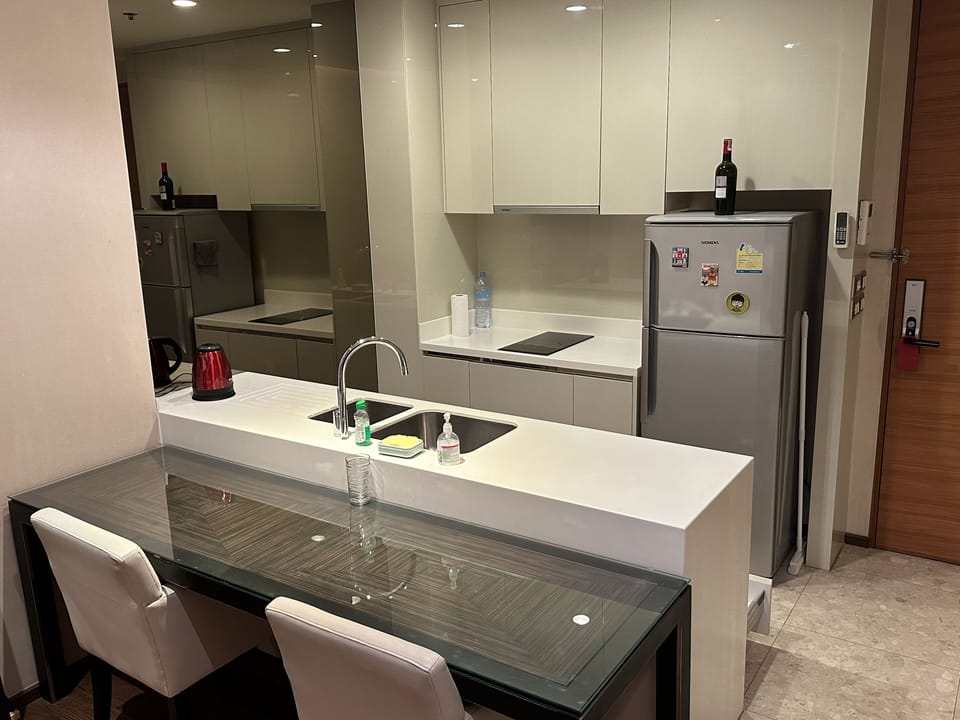 Full kitchen with 2 burner Cooktop, microwave, full-size refrigerator. 