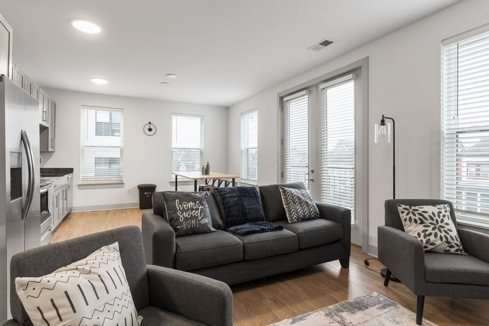Deluxe Apartment | Living area | 55-inch Smart TV with digital channels, streaming services
