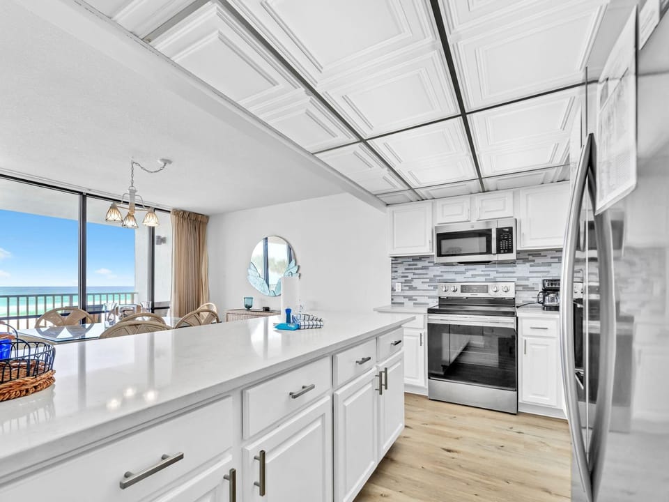 Condo, Multiple Beds (Windward 106 at Edgewater) | Private kitchen | Oven, toaster