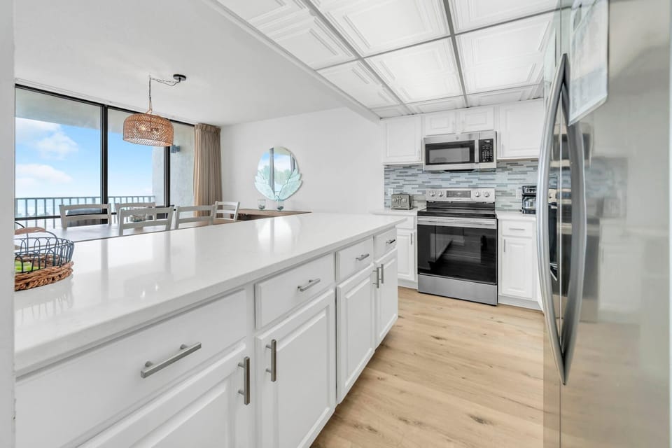 Condo, Multiple Beds (Windward 106 at Edgewater) | Private kitchen | Oven, toaster