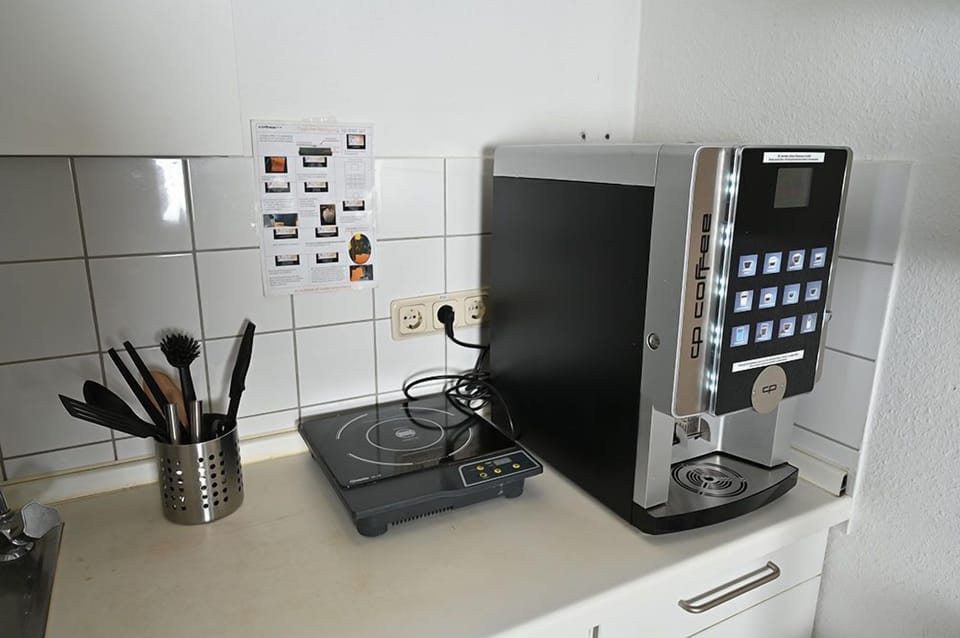 Fridge, microwave, stovetop, cookware/dishes/utensils