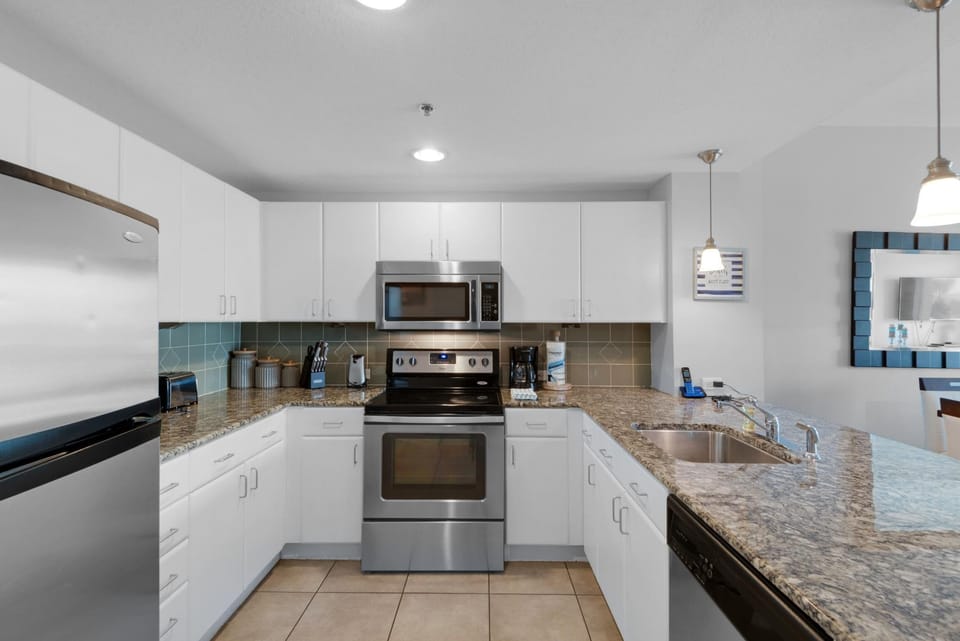 Condo, Multiple Beds (Grand Panama 1-305) | Private kitchen | Oven, toaster