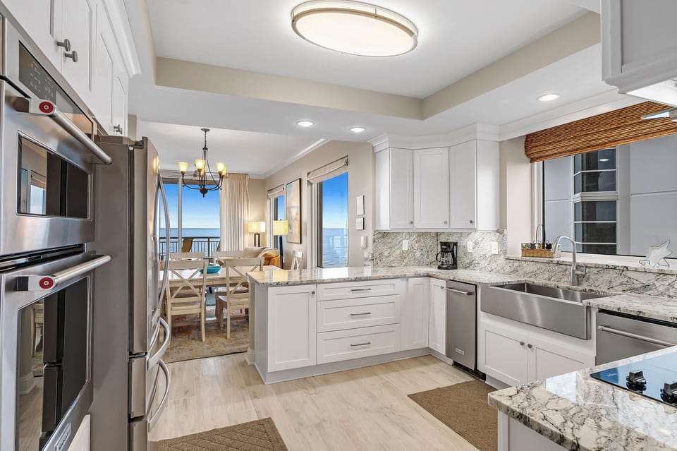 Condo, Multiple Beds (Indigo West 804) | Private kitchen | Oven, toaster, paper towels