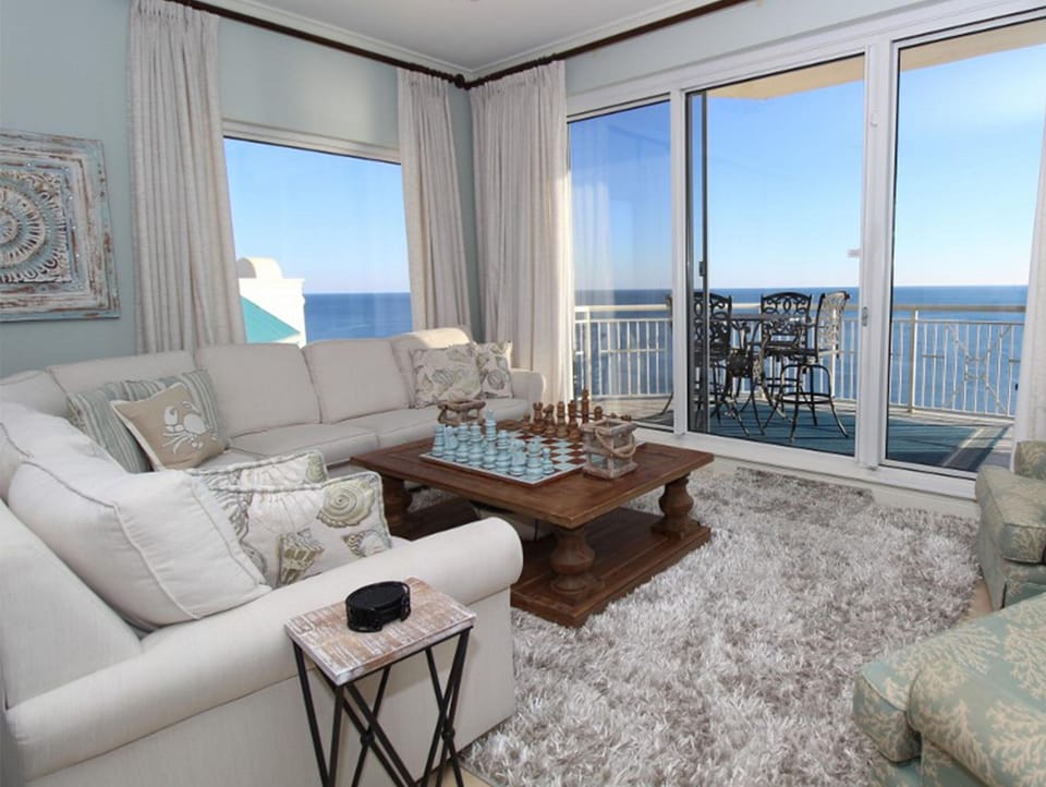 Condo, Multiple Beds (Indigo East 2001) | Living area | TV