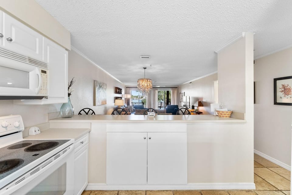 Condo, Multiple Beds (Needle Rush Point F12) | Private kitchen | Oven, toaster, paper towels
