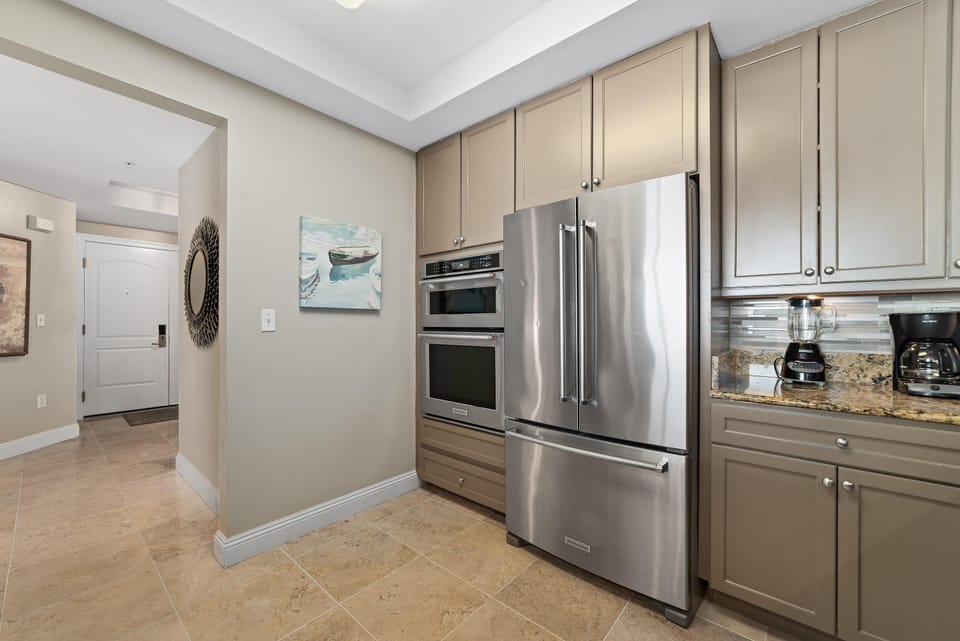 Condo, Multiple Beds (Indigo West 1403) | Private kitchen | Oven, toaster, paper towels