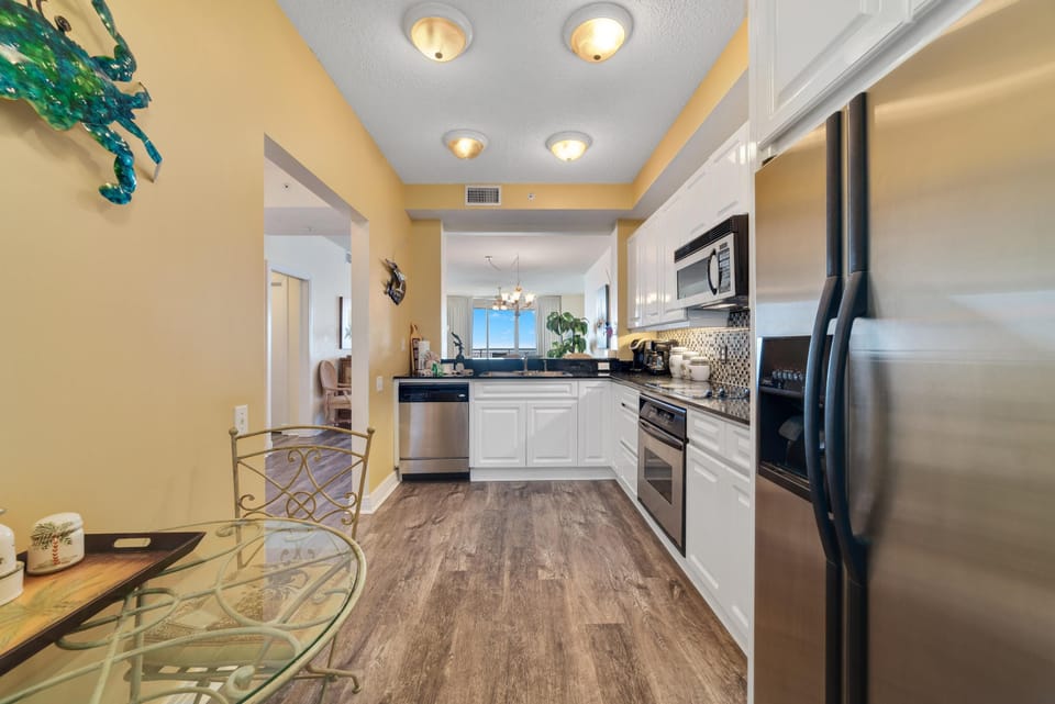 Condo, Multiple Beds (Beach Colony East 13C) | Private kitchen | Oven, toaster, paper towels
