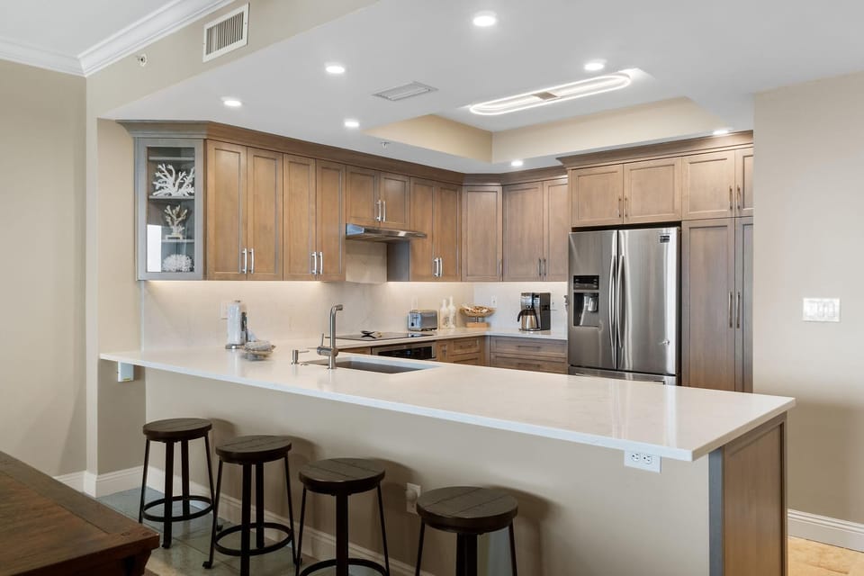 Condo, Multiple Beds (Indigo East 502) | Private kitchen | Oven, toaster, paper towels