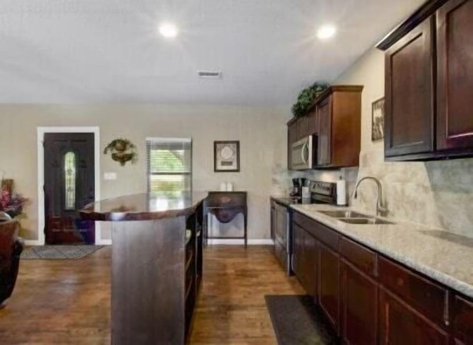 Fully stocked kitchen with granite counter tops