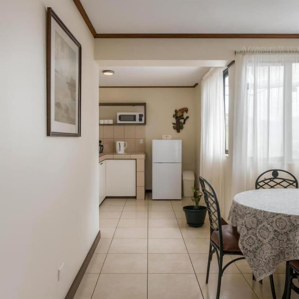 Basic Apartment | Living area | 32-inch LCD TV with cable channels, books