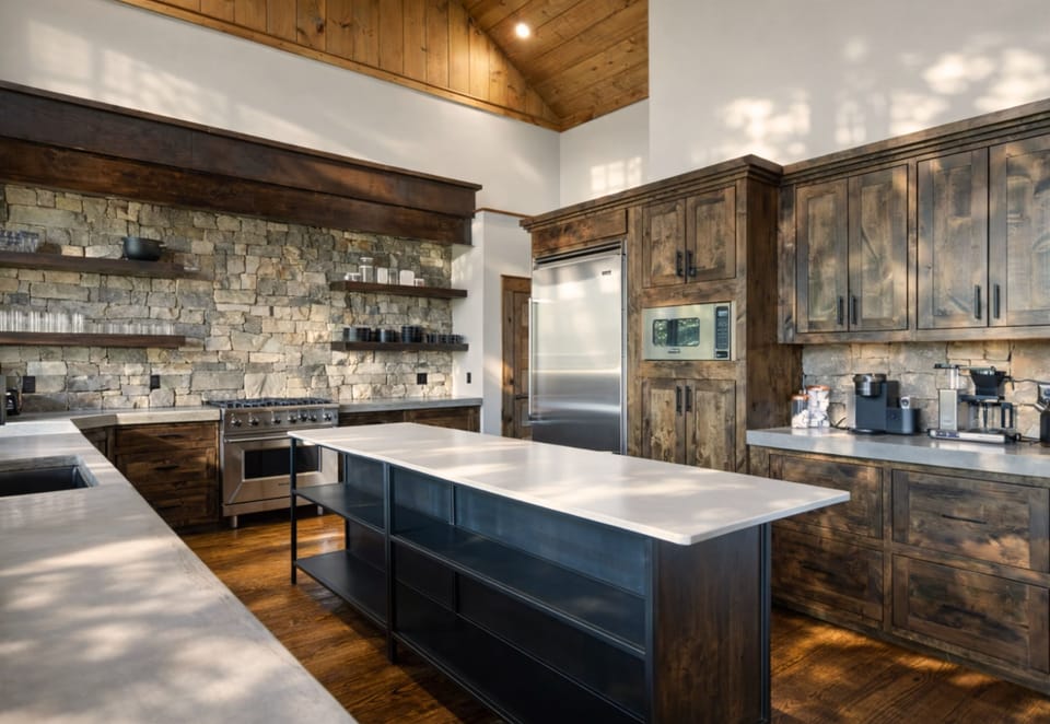 Fully equipped with Viking appliances, this stylish kitchen blends rustic elegance with modern convenience.