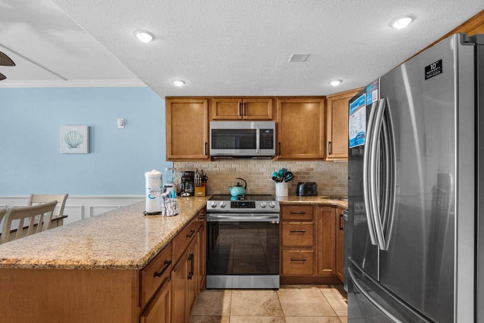 Condo, Multiple Beds (Holiday Surf and Racquet Club 319) | Private kitchen | Oven, toaster