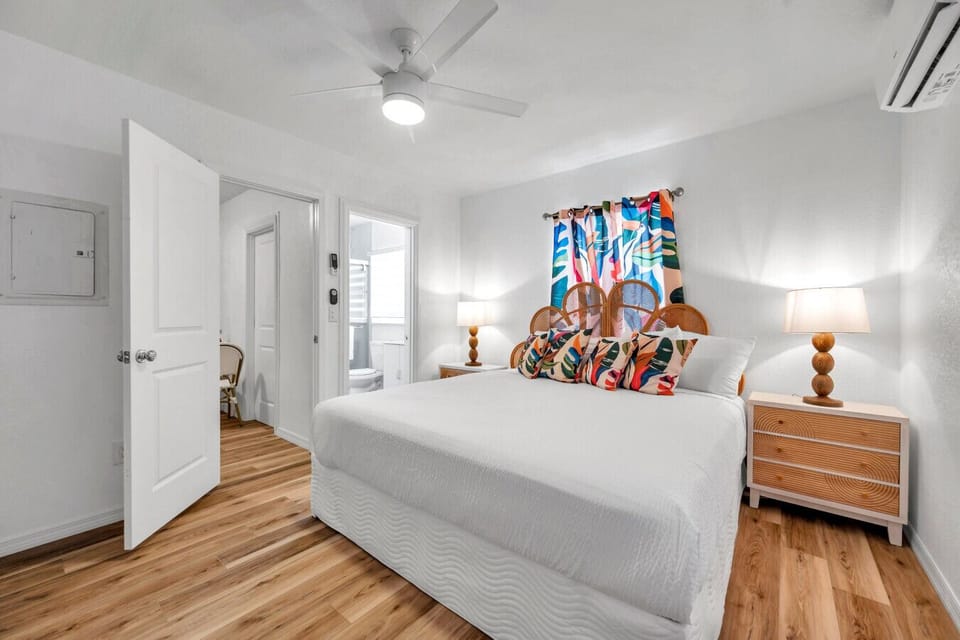 Peaceful bedroom retreat w/ simple decor & a calm atmosphere for restful nights.