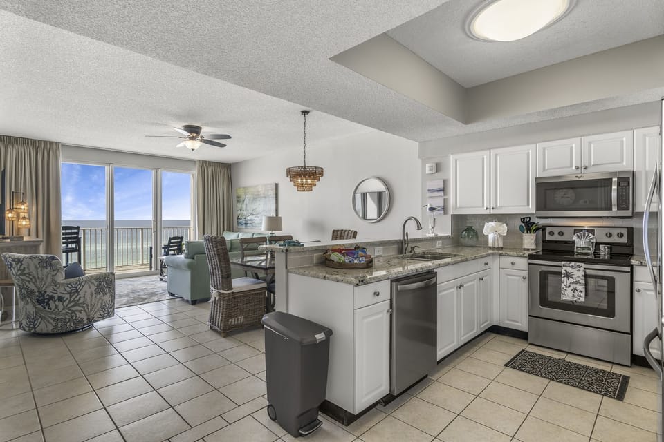 Cook meals in your fully stocked kitchen/home away from home with Gulf views!