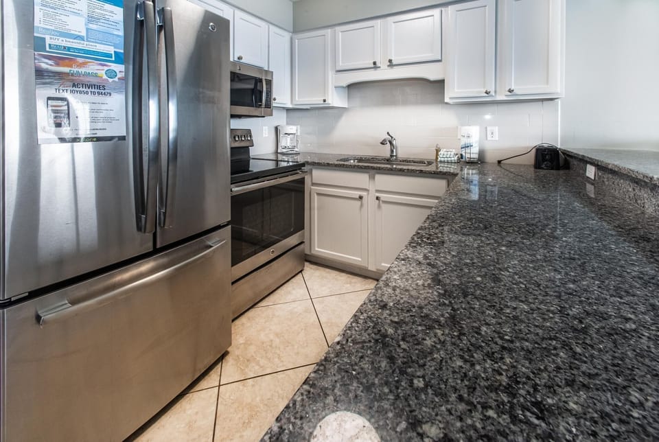 Condo, 1 King Bed with Sofa bed (Windancer 111) | Private kitchen | Oven, toaster