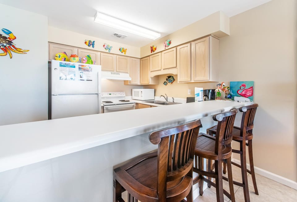 Condo, 1 King Bed with Sofa bed (Windancer 207) | Private kitchen | Oven, toaster