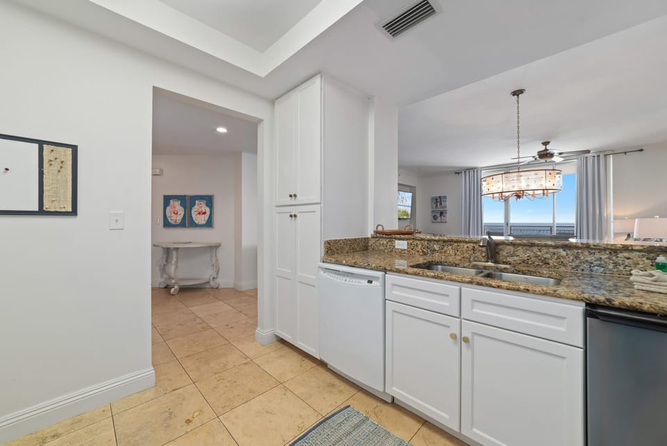 Condo, Multiple Beds (Indigo West 1802) | Private kitchen | Oven, toaster, paper towels
