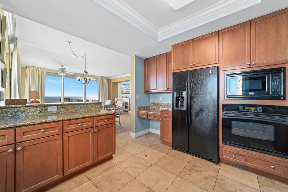 Condo, Multiple Beds (Indigo West 801 with Private Poolside) | Private kitchen | Oven, toaster, paper towels